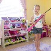 "My first rifle" - American children pose with their weapons