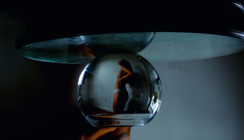 Naked Dana, filmed through an aquarium