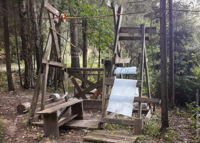Power complex "Pinocchio": Wooden rocking chair in the forest Power complex "Pinocchio": Wooden rocking chair in the forest