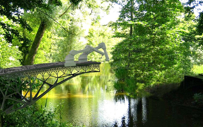 Robots 3D print a bridge over an Amsterdam canal