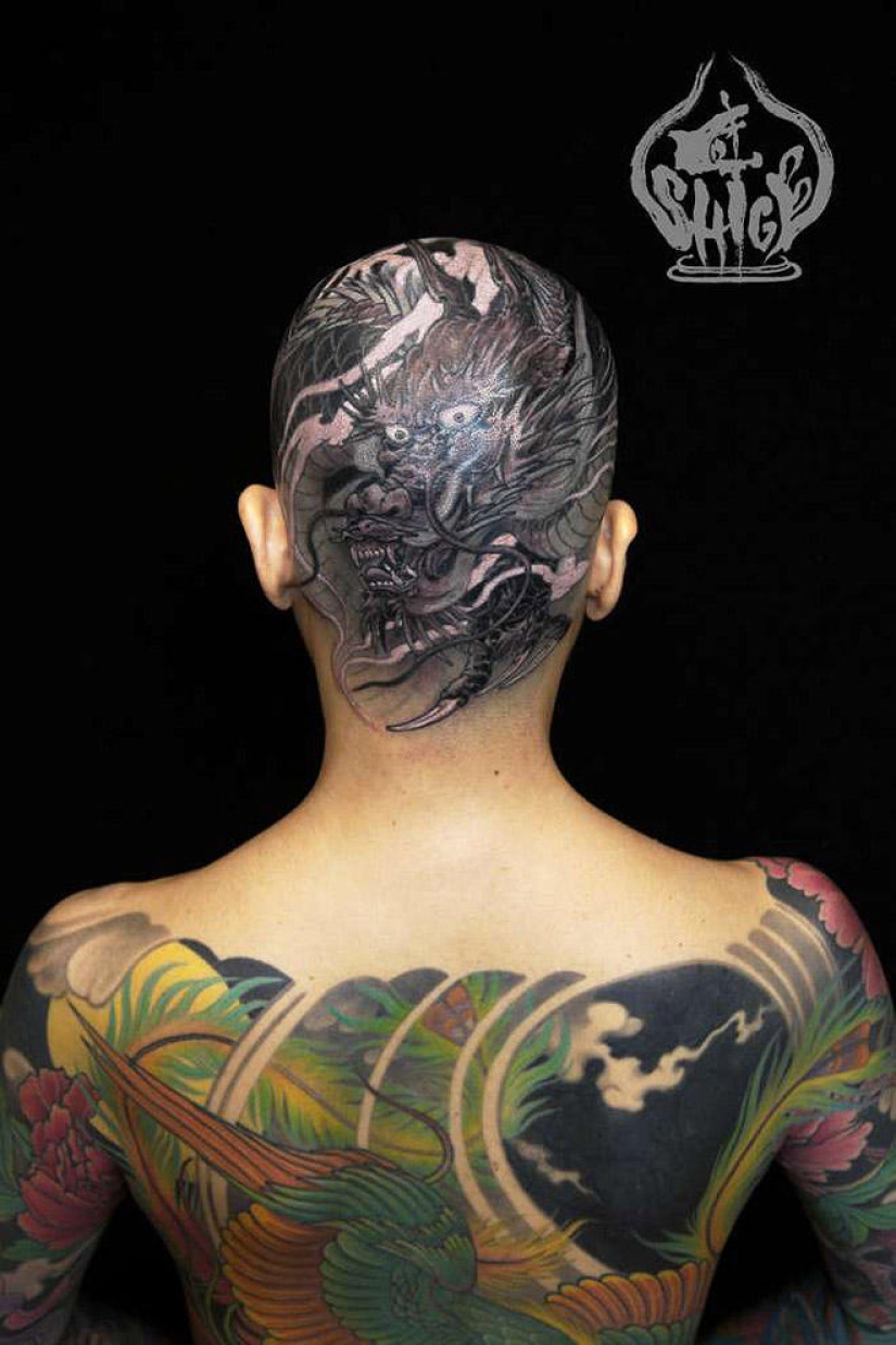 Shige is a Japanese full body tattoo artist. Shige is a Japanese full body tattoo artist.
