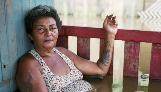 Shocking photos of people in flooded houses