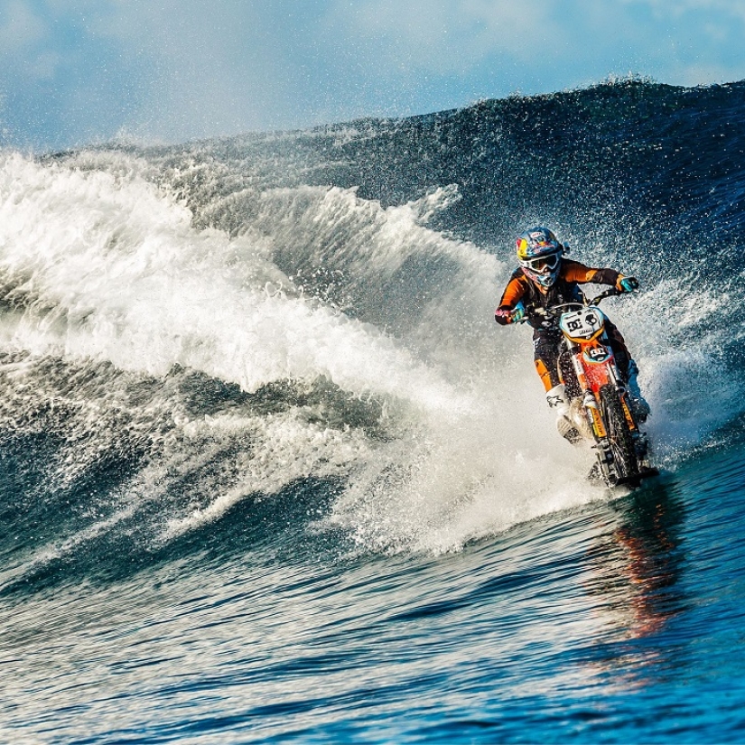 Surfing legend: Robbie Maddison rides a wave on a motorcycle