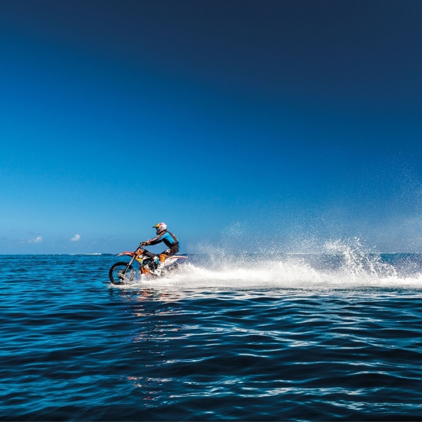 Surfing legend: Robbie Maddison rides a wave on a motorcycle