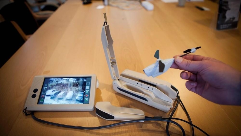 The Black Hornet is a military helicopter drone that fits in the hand The Black Hornet is a military helicopter drone that fits in the hand