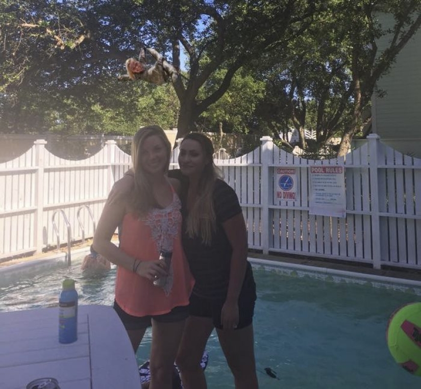 The girl couldn't go to the beach with her friends, so she put herself in their photo