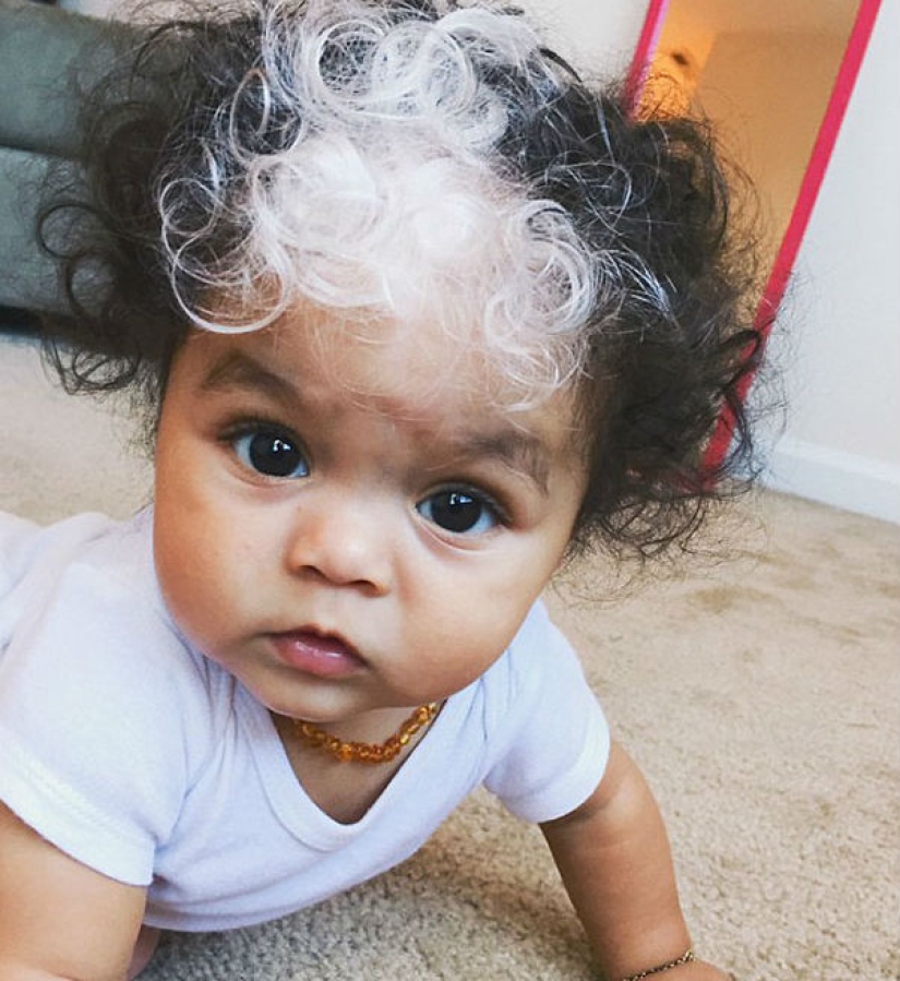 The girl was born with white bangs, exactly the same as her mother, grandmother and great-grandmother