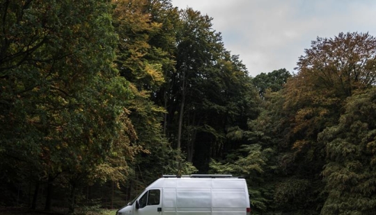 The photographer made a cozy and comfortable mobile home out of a 16-year-old van