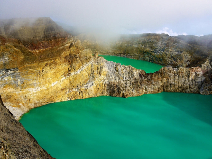Unique tricolor lakes in the crater of the Kelimutu volcano