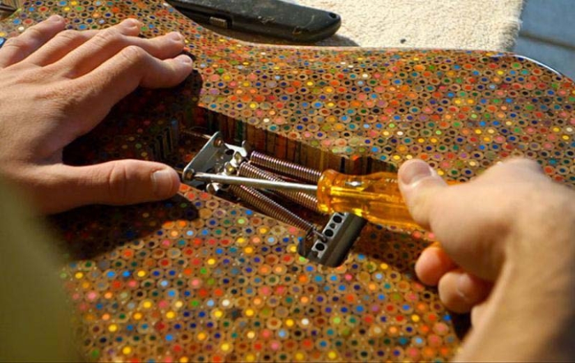 How to create a unique guitar? We need 500 dollars, 1200 colored pencils, enthusiasm and time