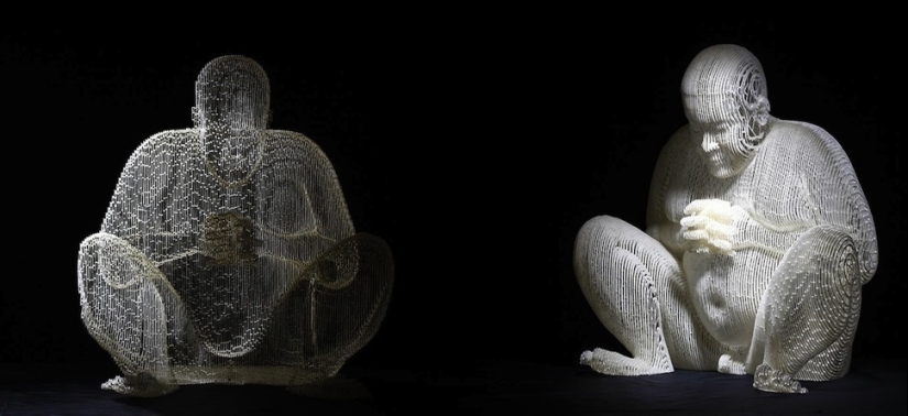 Multilayered paper sculptures that are at a certain angle become nearly invisible