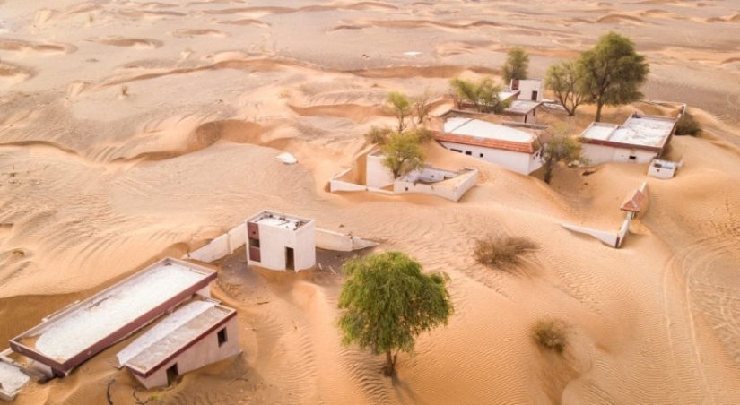 The abandoned ghost village of Al-Madam in the sands of the Emirates