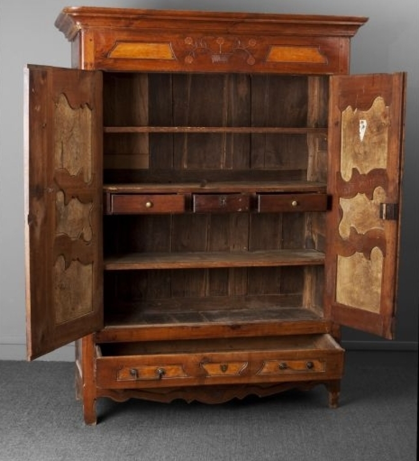 What will happen if the armoire is propped up with a jardiniere. How, you don't know what it is yet?