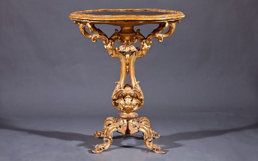 What will happen if the armoire is propped up with a jardiniere. How, you don't know what it is yet?