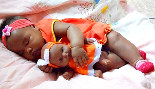 20 Kids Who Look Exactly Like Their Dolls