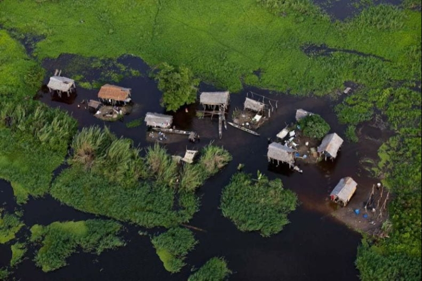 A picturesque village in a swamp in South Sudan A picturesque village in a swamp in South Sudan