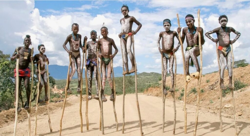 Always on top: why Banna men prefer to walk on stilts