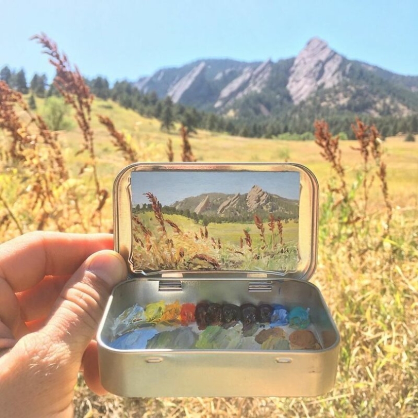 Artist draws the thumbnails of landscapes in the boxes from the candy