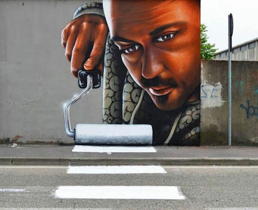 Callejero interactivo de arte: el artista entra en 3D pinturas en la calle Callejero interactivo de arte: el artista entra en 3D pinturas en la calle