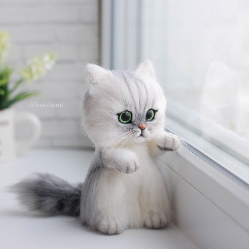 Cute kittens made of felt from the needlewoman Elizabeth Delektorskaya