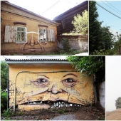 Faces on buildings by Nikita Nomerz