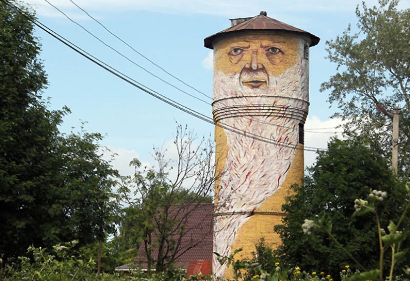 Faces on buildings by Nikita Nomerz