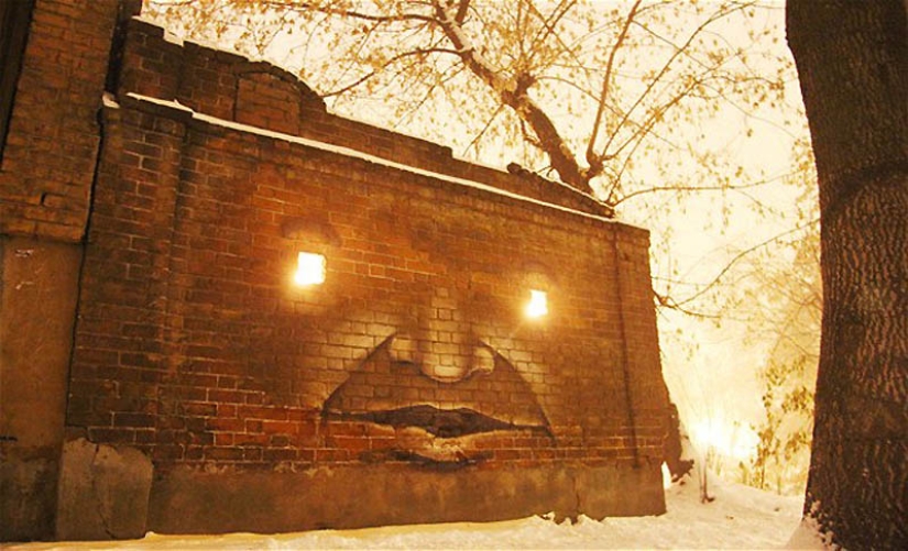Faces on buildings by Nikita Nomerz