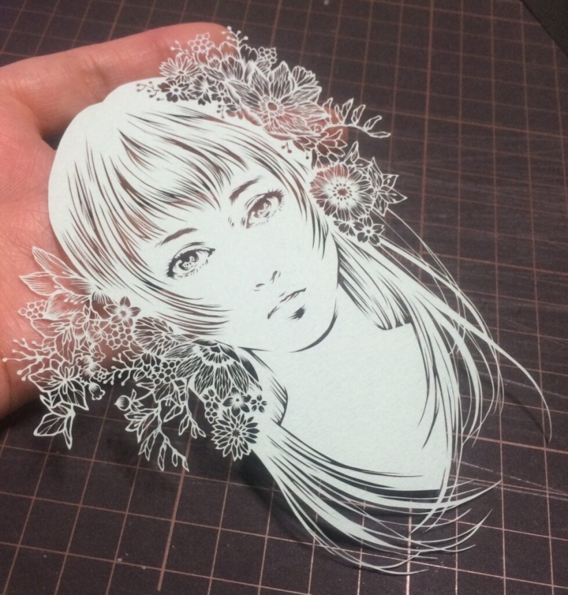 Filigree paper carving by Japanese artist Rika Fukuda