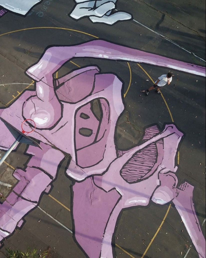 Giant murals on the ground by Australian Kitt Bennett