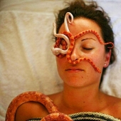 Massage with snakes