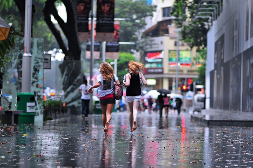 Rainy mood: a photographer from Singapore catches the emotions of people during a downpour