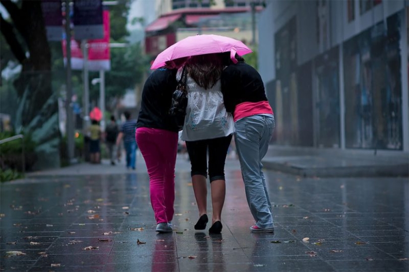 Rainy mood: a photographer from Singapore catches the emotions of people during a downpour