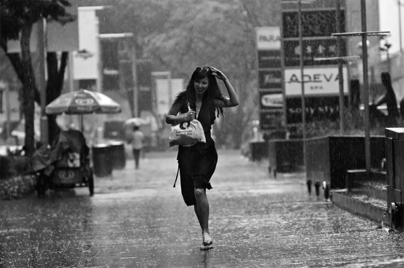 Rainy mood: a photographer from Singapore catches the emotions of people during a downpour