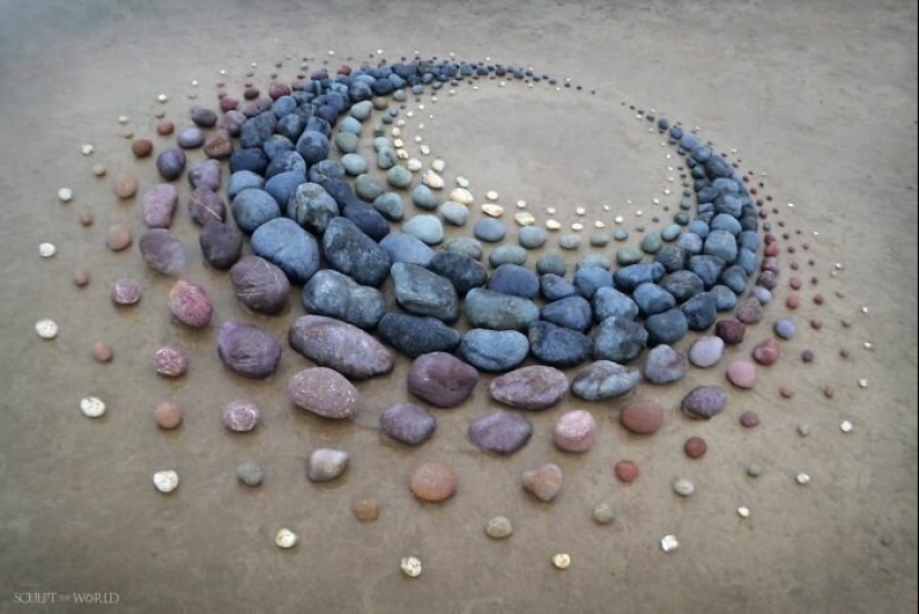 The artist creates the mood of their stunning works from the stones on the beach The artist creates the mood of their stunning works from the stones on the beach