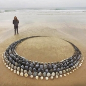 The artist creates the mood of their stunning works from the stones on the beach