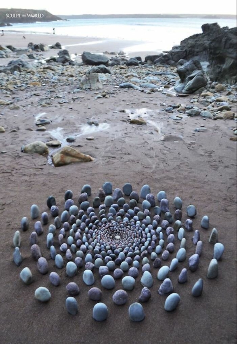 The artist creates the mood of their stunning works from the stones on the beach The artist creates the mood of their stunning works from the stones on the beach