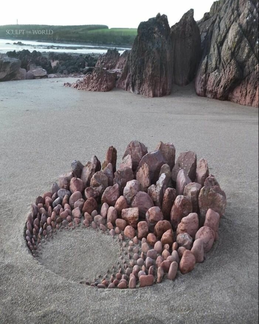 The artist creates the mood of their stunning works from the stones on the beach The artist creates the mood of their stunning works from the stones on the beach