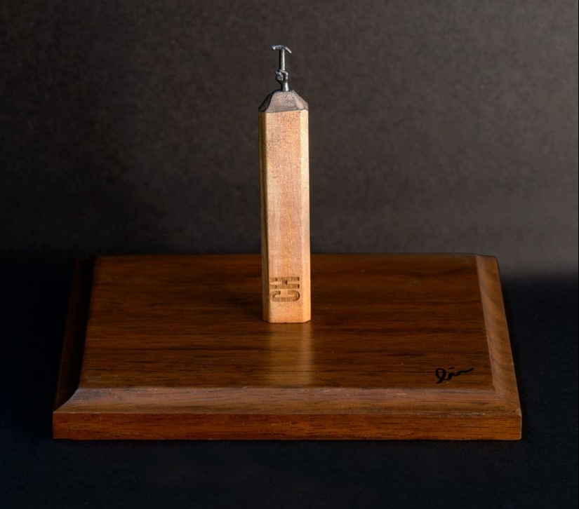 The artist cuts out tiny masterpieces from pencil slates