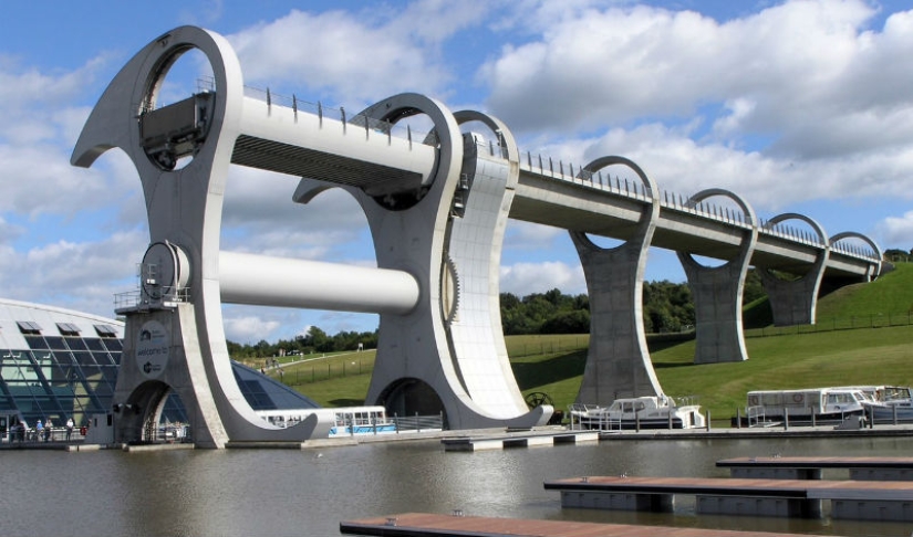 The Falkirk Wheel is a unique rotating structure that lifts entire ships The Falkirk Wheel is a unique rotating structure that lifts entire ships
