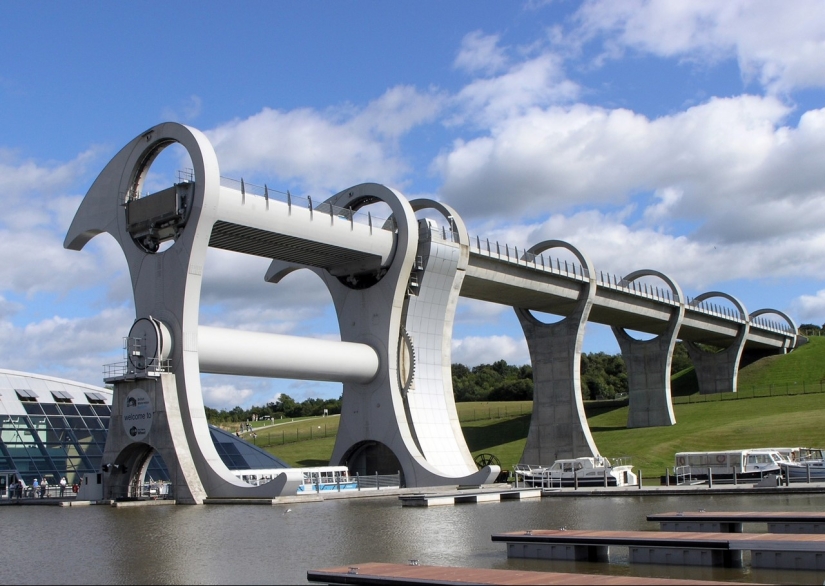 The Falkirk Wheel is a unique rotating structure that lifts entire ships The Falkirk Wheel is a unique rotating structure that lifts entire ships