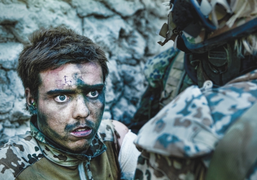 They look, but they don't see: the faces of soldiers who have gone through hell They look, but they don't see: the faces of soldiers who have gone through hell