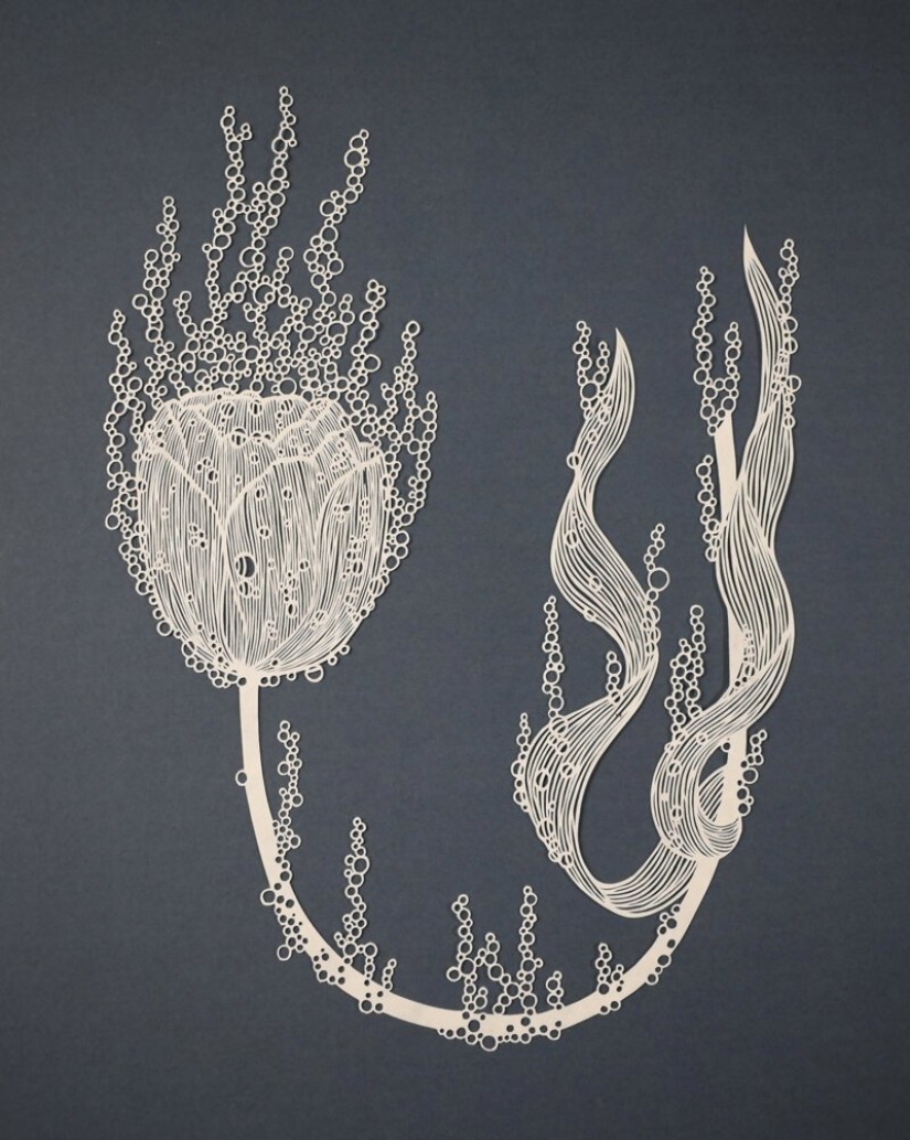 Una chica corta intrincadas obras maestras de papel Una chica corta intrincadas obras maestras de papel