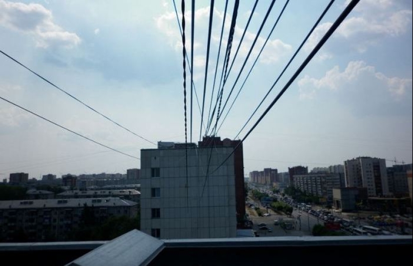 Who and why stretches wires between houses Who and why stretches wires between houses