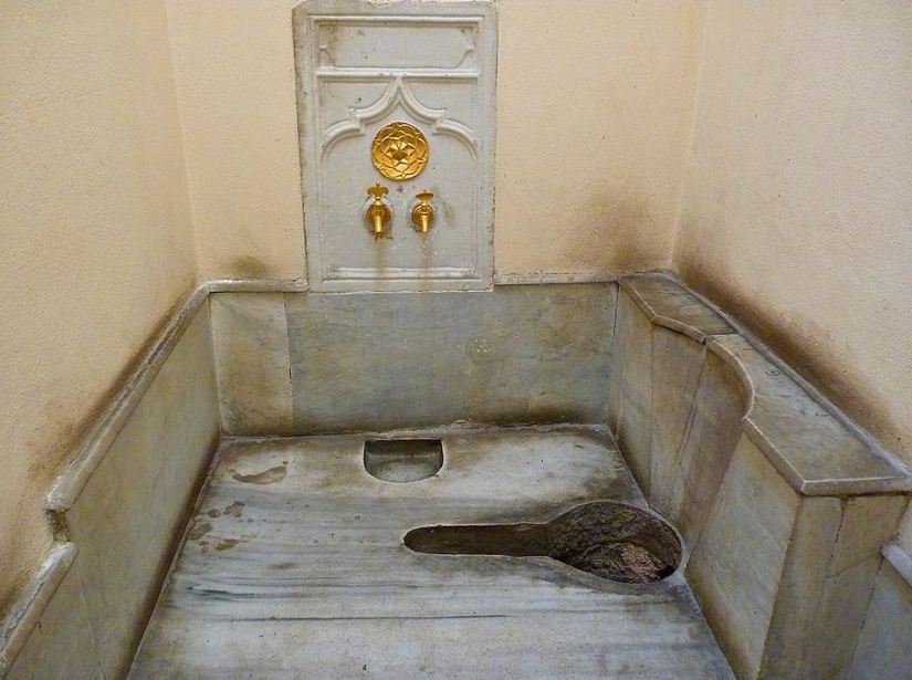 Why are there two different types of toilets in Turkish apartments