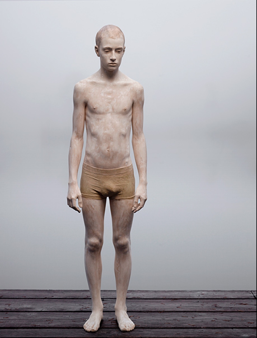 Youth captured in hyper-realistic wood sculptures
