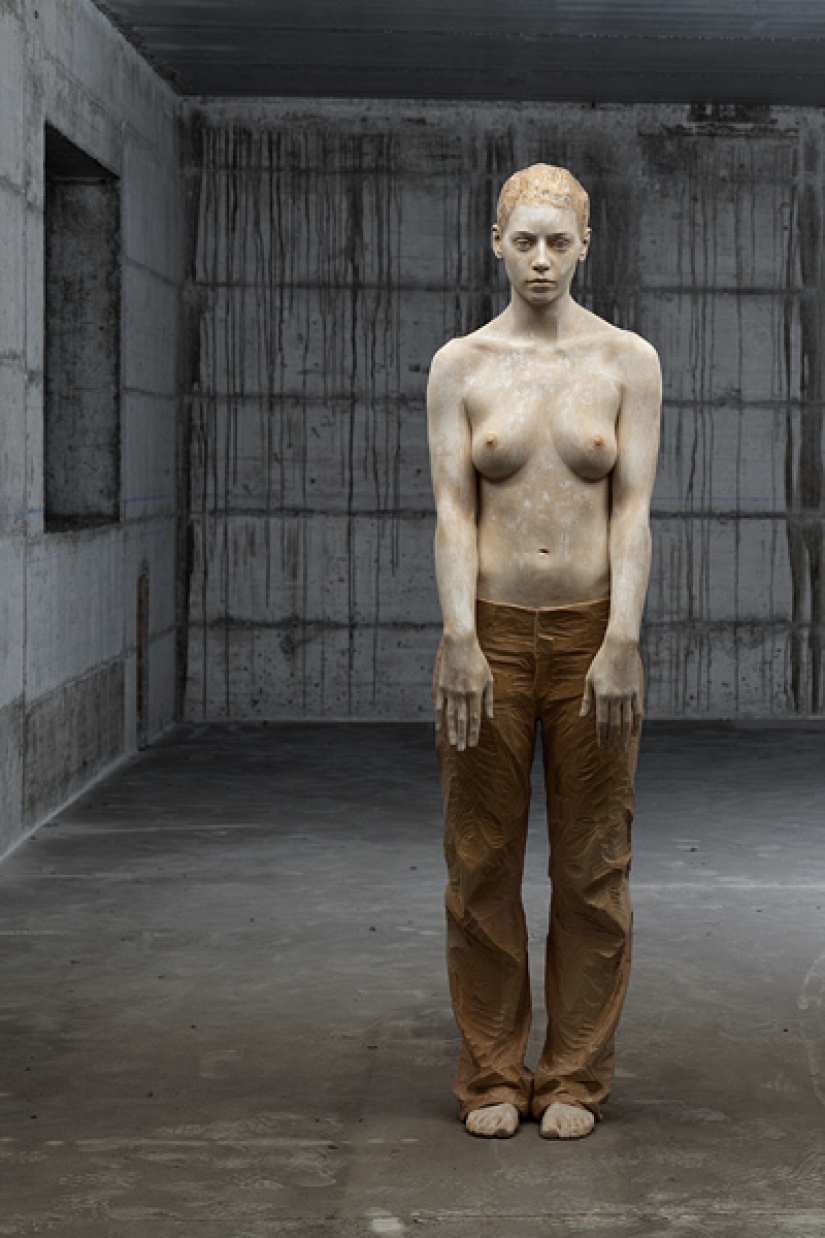 Youth captured in hyper-realistic wood sculptures