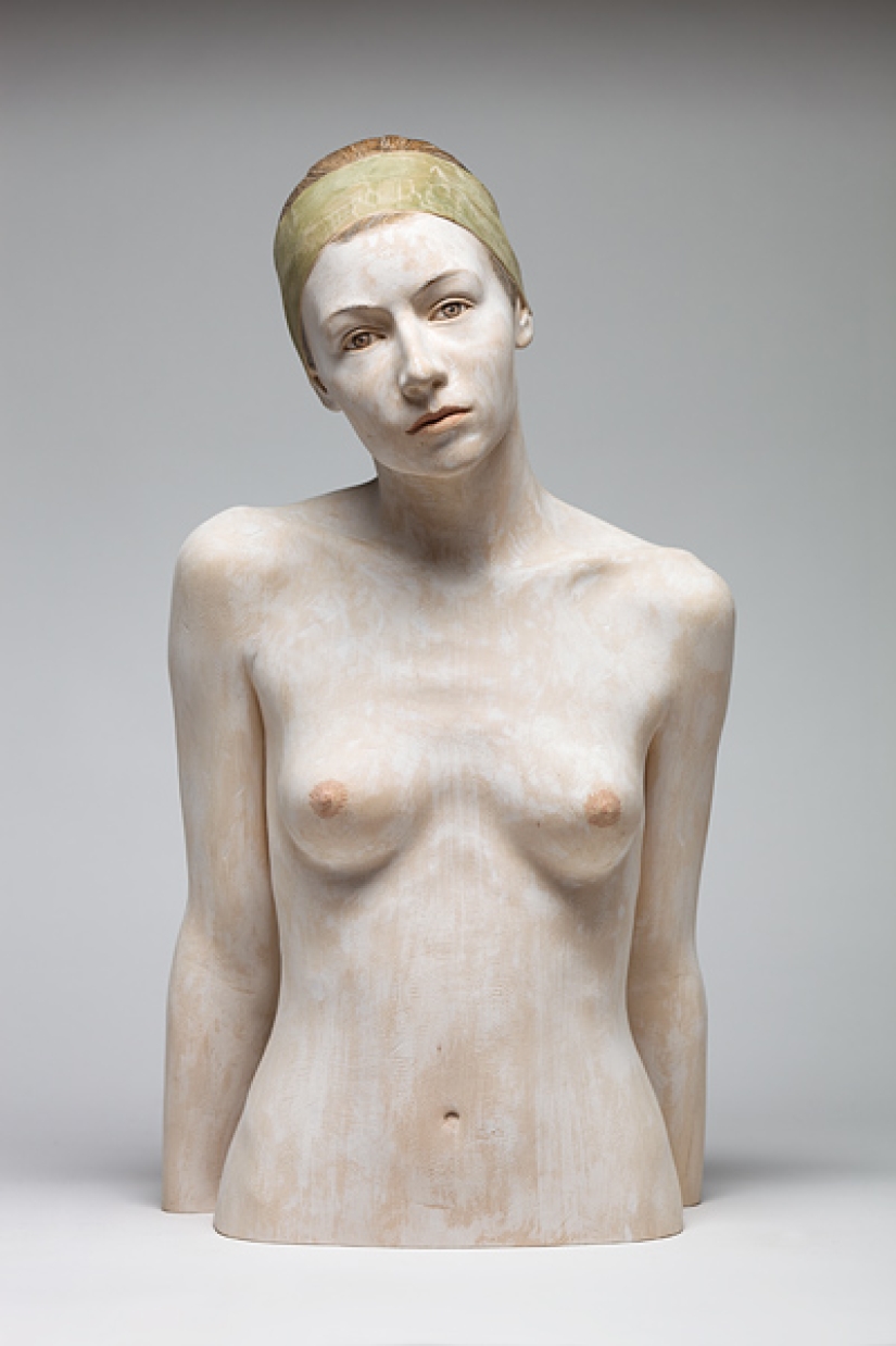 Youth captured in hyper-realistic wood sculptures